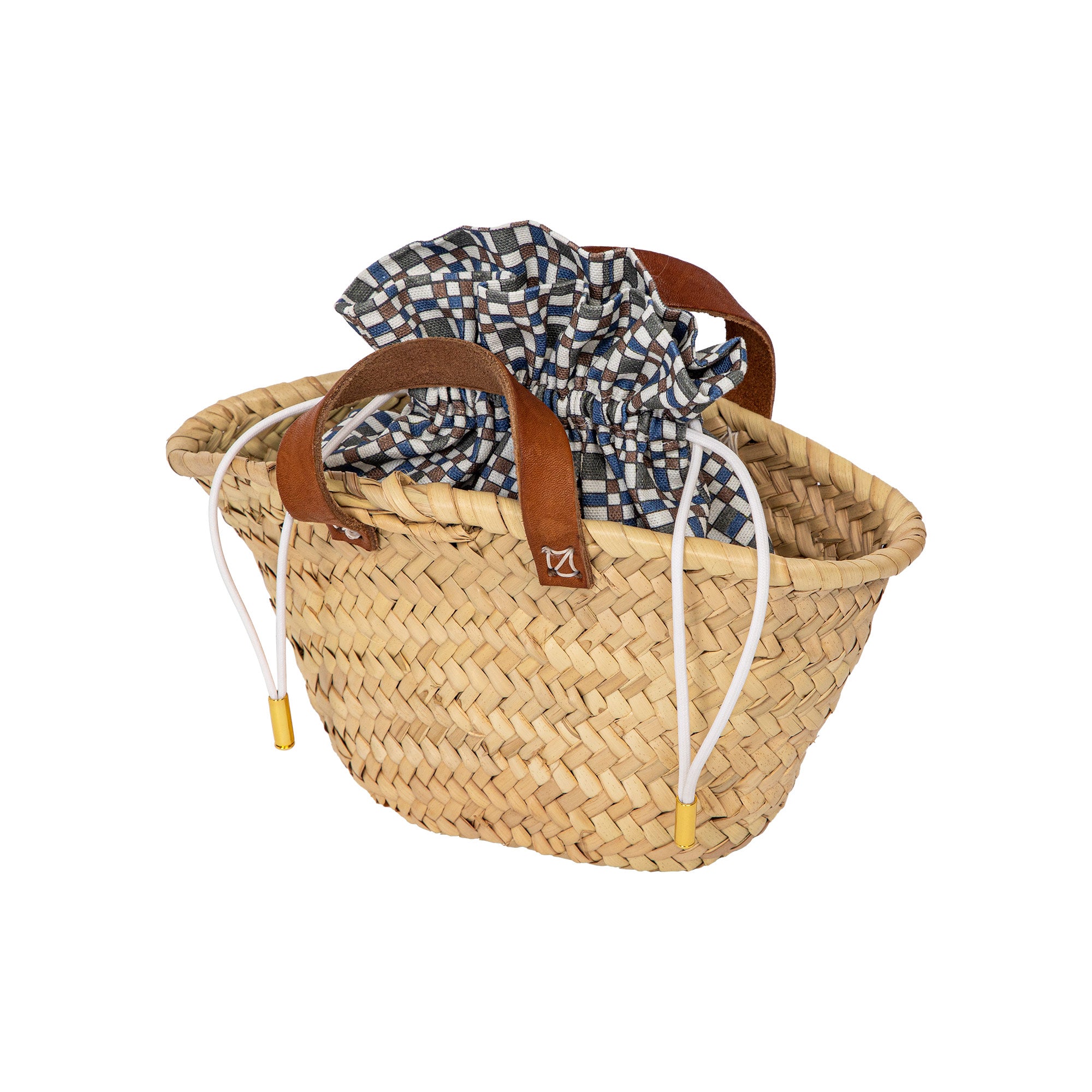 Choix x Coco Shop cotton pouch with a tile pattern lining a Moroccan straw basket
