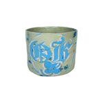 front of cachepot