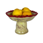 front of fruit stand with lemons in it